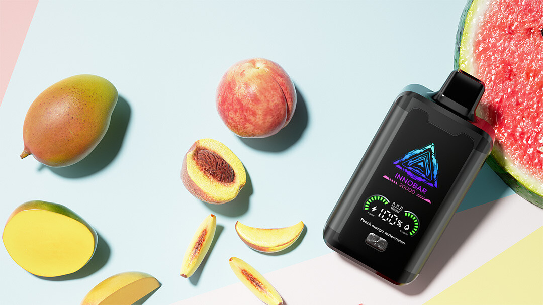 Black disposable vape device with a smart screen and watermelon-peach flavor, illustrating smart screen features in modern disposable vapes.